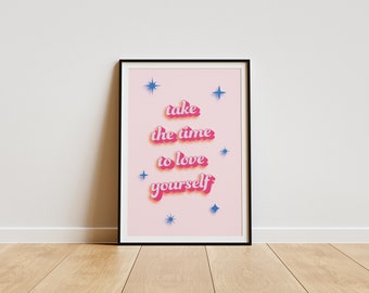 May include: A pink framed print with the text "take the time to love yourself" in a retro font with blue stars scattered around the text.