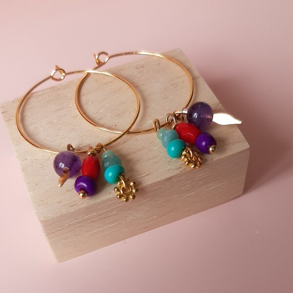 Creole earrings with multi-colored boho beads and small golden charms for women or young girls