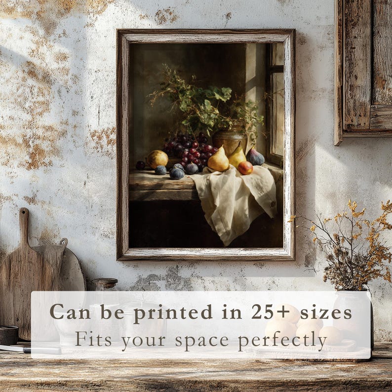 May include: A framed still life painting featuring a table with grapes, pears, and plums. A white cloth is draped over the table. The painting is in a rustic, wooden frame. Text on the bottom reads: "Can be printed in 25+ sizes. Fits your space perfectly."