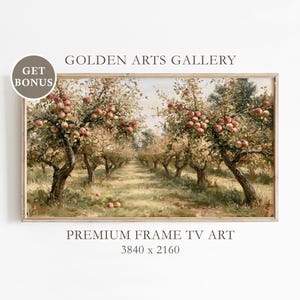 May include: A rectangular landscape painting in a wooden frame depicting an apple orchard with rows of trees laden with red apples. The text GOLDEN ARTS GALLERY, PREMIUM FRAME TV ART, and 3840 x 2160 are visible along with a GET BONUS circular badge.