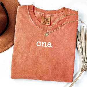 Comfort colors cna nurse shirt, Retro nurse shirt, Minimalistic nurse shirt, Vintage Nurse Shirt, Oversized Soft shirt, Cna T-shirt gift zdjęcie 5