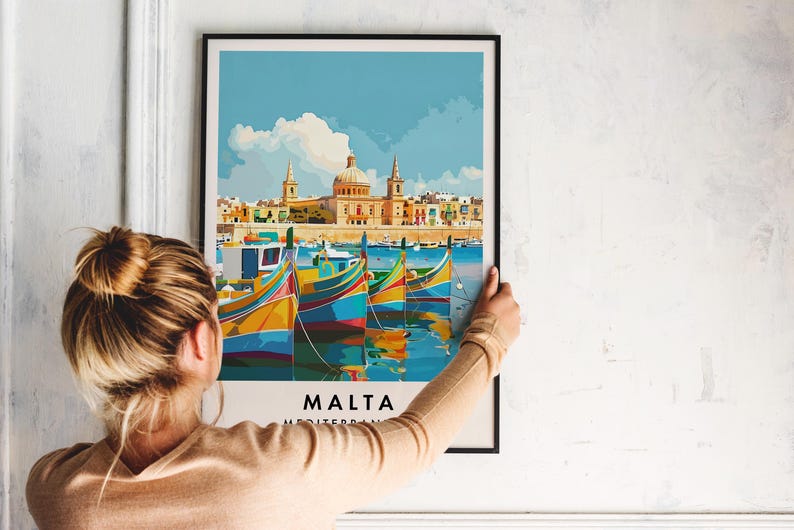May include: A colorful poster with a view of a city in Malta. The poster features a cityscape with buildings and boats in the harbor. The text "MALTA MEDITERRANEAN" is at the bottom of the poster.