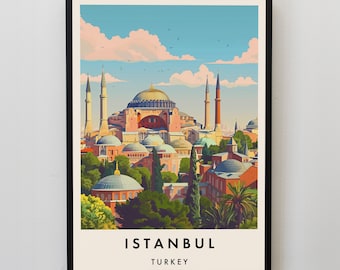May include: A framed art print featuring a colorful illustration of Istanbul, Turkey. The artwork depicts the Hagia Sophia with its domes and minarets, set against a blue sky with clouds. The word "ISTANBUL" and "TURKEY" are printed at the bottom.