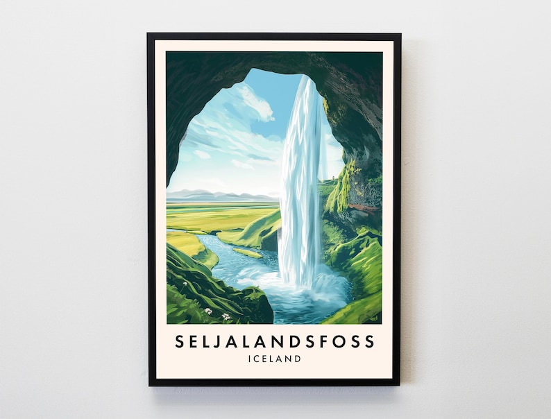 May include: A framed art print of Seljalandsfoss waterfall in Iceland. The artwork depicts a waterfall cascading into a river, with green hills and a blue sky. The text "SELJALANDSFOSS ICELAND" is at the bottom.