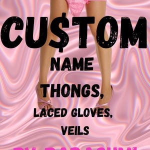 May include: Pink thong with text "CUSTOM NAME THONGS, LACED GLOVES, VEILS BY BADASUMI" on a pink and white swirled background. The image shows a person wearing pink high heels.