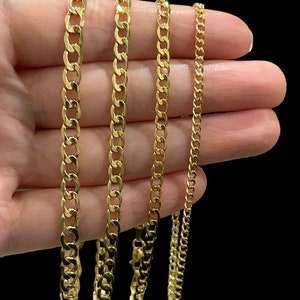 May include: Four gold chains of different lengths and thicknesses.