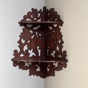 Ornate Wooden Corner Wall Shelf With Intricate Carved Design