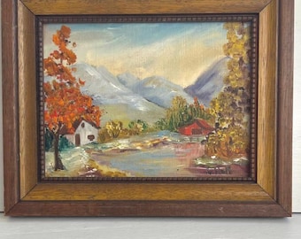 ヴィンテージの山と川の油絵：木製フレーム入りのサイン入り風景画