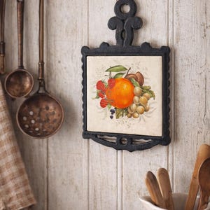 Salvamanteles vintage de hierro fundido: Azulejo de cerámica con forma de fruta, decoración colgante para cocina estilo rústico.