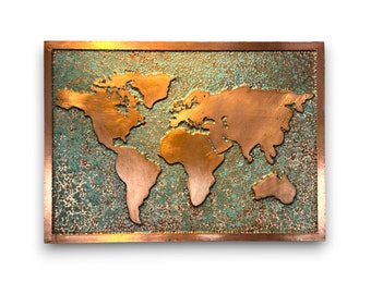 May include: A copper-colored world map embossed on a textured, teal-green background. The map is framed in a copper-colored border.