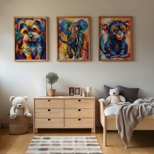Collection of three abstract animal art pieces in a kids room: Maltese puppy, elephant, monkey.