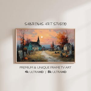 Puede incluir: Pintura de paisaje enmarcada que representa una iglesia y un cementerio al atardecer. El cielo es una mezcla de tonos naranja y rosa, con una luna llena. La obra de arte está etiquetada como "Sabrinas Art Studio" y "Premium & Unique Frame TV Art".