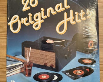 LP duplo em vinil com 26 sucessos originais, gravado durante as sessões de 1978 (ARI-1006) - New Oldies