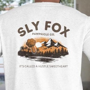 Sly Fox Pawpsicle Co. Disney Zootopia Nick Wilde Premium Unisex Crewneck T-shirt Bella Canvas 3001 immagine 1