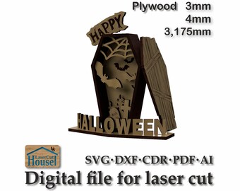 May include: Laser cut Halloween decoration made of plywood. The decoration features a coffin with a bat and spider web design, and the words "Happy Halloween".