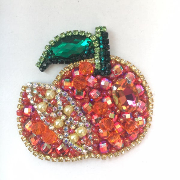 A brooch ,Swarovski crystal,stones, present,handmade,bead embroidery