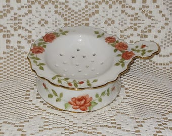 Antique Porcelain Tea Strainer with Rose Motifs