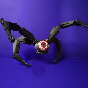Leaper with moving legs and lit up eye | Remote-Controlled RGB Light | Cosplay Props | Gamer Room Decor | Gift for Sci-Fi Fans