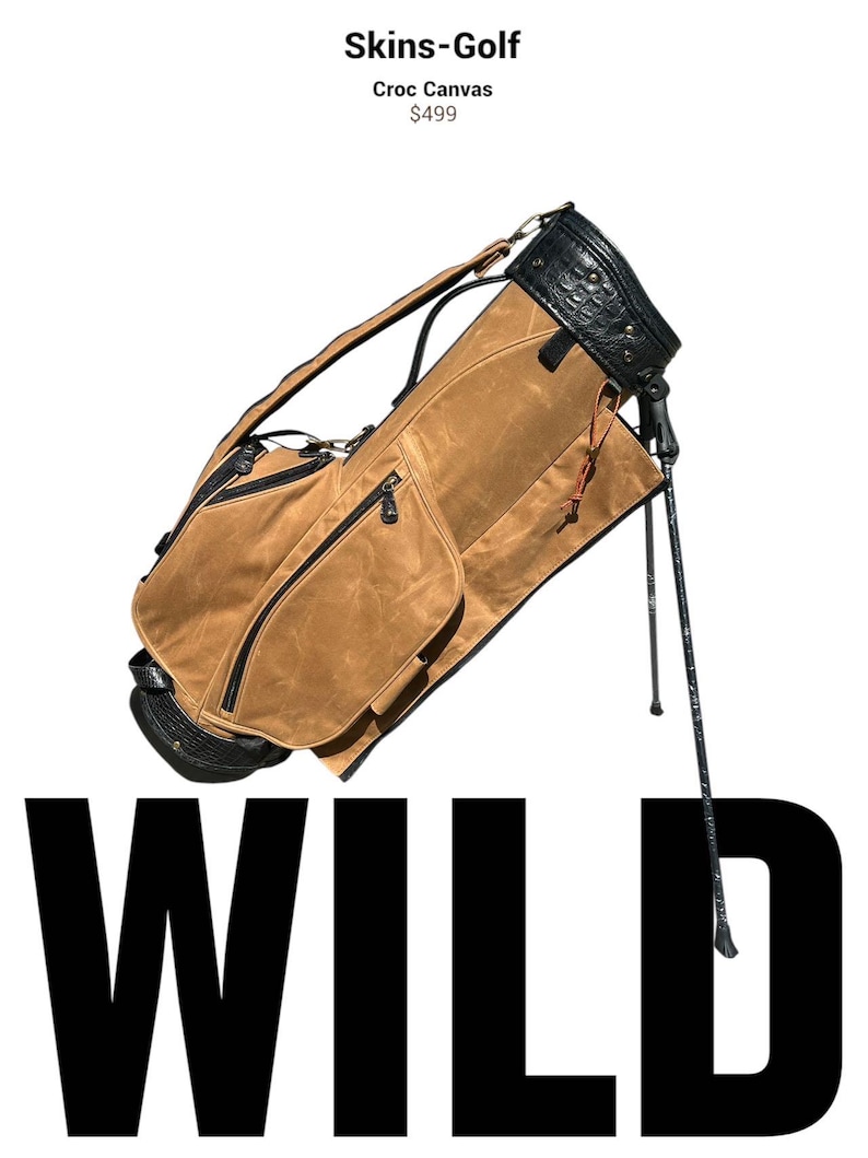 May include: A brown golf bag with black detailing and a crocodile-effect top. The bag features a stand and several pockets. The word "WILD" is shown in large, bold, black letters.