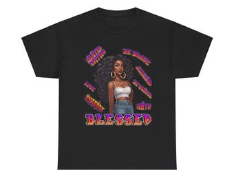 May include: A black t-shirt featuring a graphic of a person with voluminous dark curly hair, wearing a white crop top and blue jeans. The design includes the text BLESSED, LIMITED EDITION, BE BRAVE, AMAZING, BE UNIQUE, LOVE, INSPIRE, and FAITH.