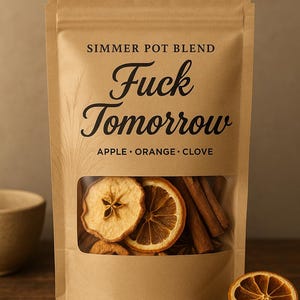 May include: A brown paper bag labeled "Simmer Pot Blend" with the text "Fuck Tomorrow." The bag has a clear window showing dried apple slices, orange slices, and cinnamon sticks. The ingredients listed are apple, orange, and clove.