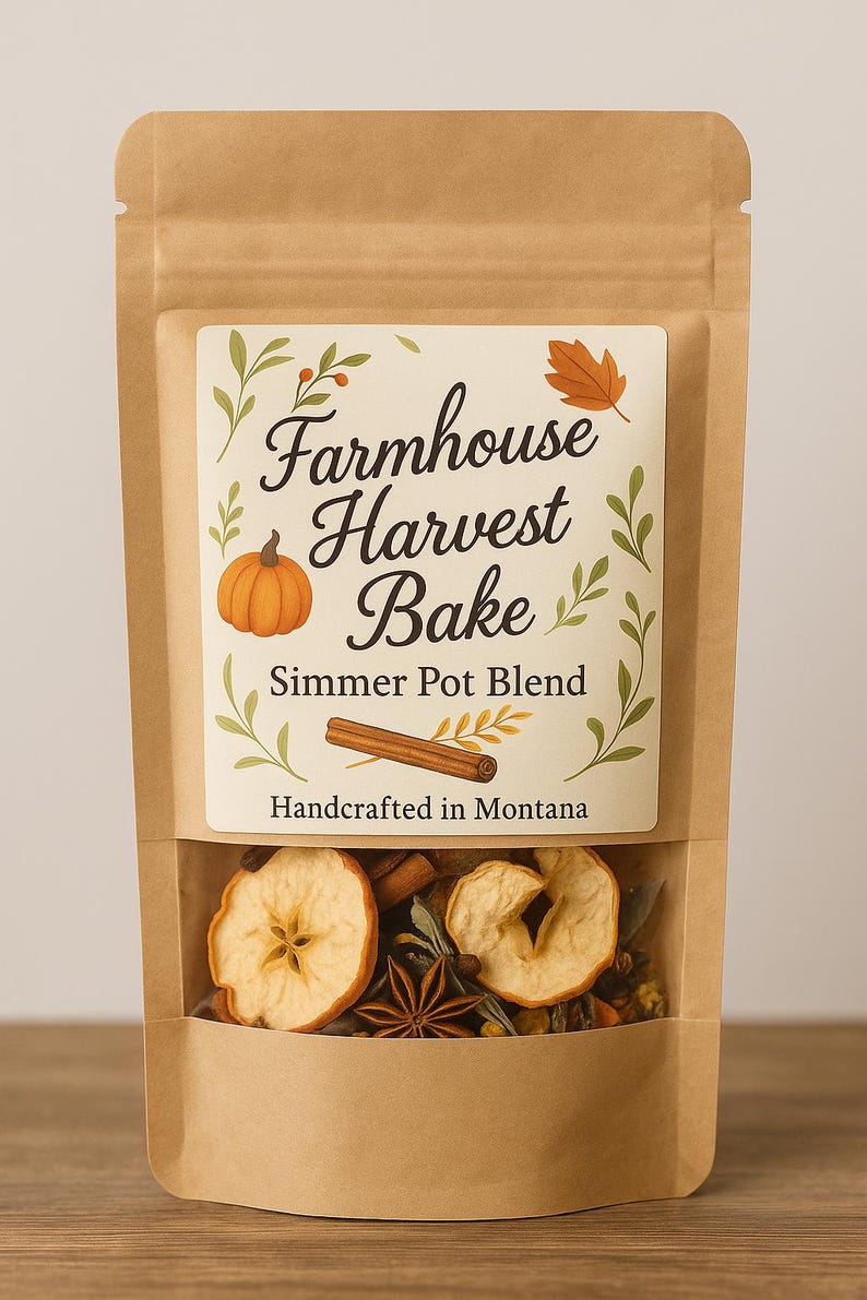 May include: A brown paper bag with a clear window displaying dried apple slices, cinnamon sticks, and star anise. The label reads "Farmhouse Harvest Bake Simmer Pot Blend" with a pumpkin and leaf illustration. "Handcrafted in Montana" is also printed on the label.