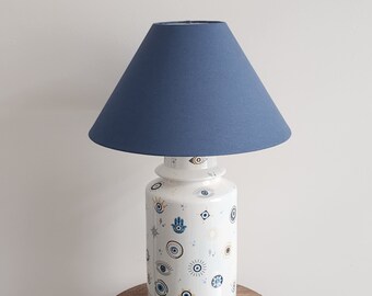 This handmade ceramic lampshade adds aesthetic charm and elegance to any room, infusing your home with artistic touches.