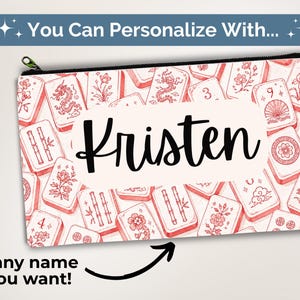 May include: A rectangular zippered pouch featuring a repeating pattern of red and white mahjong tiles with floral and dragon motifs. The center displays the name Kristen in black script. Text above reads You Can Personalize With and below reads any name you want.