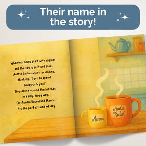 May include: An open children's book with a yellow page featuring text about Auntie Rachel and Marcus, and an illustration page showing two steaming mugs labeled Marcus and Auntie Rachel on a wooden counter with a blue teapot on a shelf.