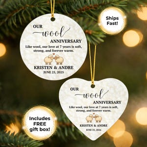 May include: Two white ceramic ornaments, one circular and one heart-shaped, featuring a textured wool pattern. Both display the text "OUR wool ANNIVERSARY", "Like wool, our love at 7 years is soft, strong, and forever warm", two sheep, and names.
