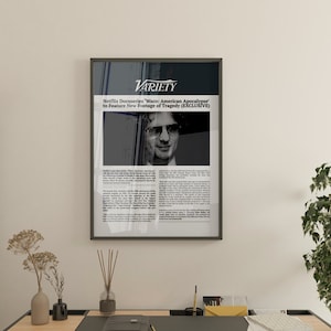 May include: A framed black and white photo of a newspaper article from Variety magazine. The headline reads "Netflix Documentary 'WACO: American Apocalypse' to Feature New Footage of Tragedy (EXCLUSIVE)".
