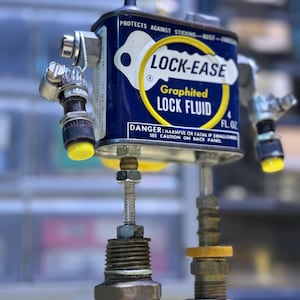Lock-Ease Robot Sculpture – Vintage Lock Fluid Tin Bot – Handmade Robot Art – Found Object Figurine – R3BOTS