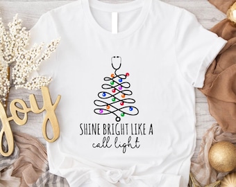 Shine Bright Like A Call Light T-shirt, Nurse Stethoscope Winter Season Shirt, Christmas Light Nurse Tee, Funny Medical Worker Holiday Gift