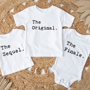 May include: Three white t-shirts with black text. The first shirt says "The Original.", the second shirt says "The Sequel.", and the third shirt says "The Finale."