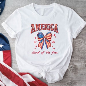 Coquette 4th Of July T-Shirt, America Land Of Free Since 1776 Shirt, Independence Day Tee, American Flag Shirt, Red White And Blue Shirt