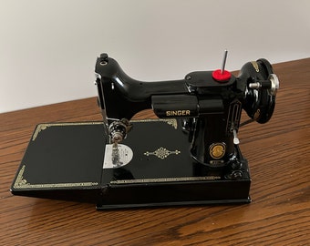 Exquisita máquina de coser Singer Featherweight 221 de 1953 - Serie AL571458