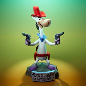 May include: A cartoon figurine of Quick Draw McGraw, a white horse character, holding two toy guns. He wears a red cowboy hat, a blue neckerchief, and a red belt. The figurine stands on a stone base with the character's name.