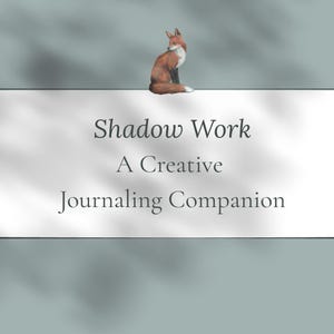 May include: A watercolour illustration of a fox perched on a white banner. The banner displays the text "Shadow Work, A Creative Journaling Companion". The background is a muted teal colour.