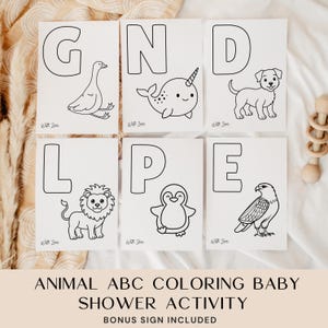 May include: Six white cards with black outlines of animals and letters G, N, D, L, P, and E. The cards are part of an animal ABC coloring activity. Text at the bottom reads: ANIMAL ABC COLORING BABY SHOWER ACTIVITY BONUS SIGN INCLUDED.