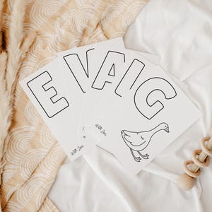 ABC Coloring Baby Shower Activity featuring adorable animal illustrations, printable alphabet sheets, baby book sign, and editable Canva template. Ideal for baby shower entertainment, keepsake gift ideas, DIY baby shower decor, and instant download games. Ready-to-print 5x7 and A5 pages included.