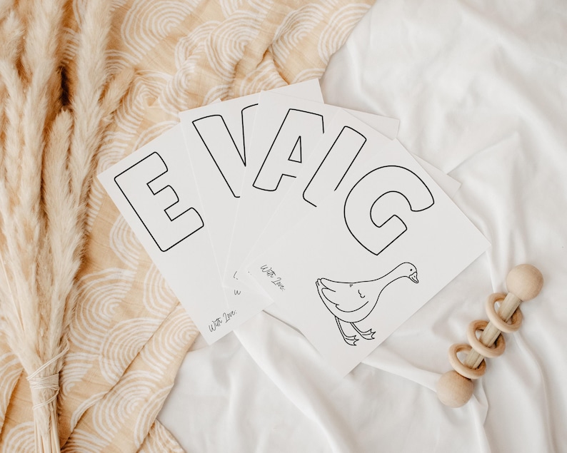 ABC Coloring Baby Shower Activity featuring adorable animal illustrations, printable alphabet sheets, baby book sign, and editable Canva template. Ideal for baby shower entertainment, keepsake gift ideas, DIY baby shower decor, and instant download games. Ready-to-print 5x7 and A5 pages included.