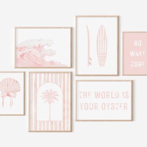 A 6-piece digital wall art set featuring coastal and seashell-inspired prints, perfect for a pink nursery, baby girl room, or beach-themed space. Includes a soft watercolor wave, a delicate seashell with a pink bow, a palm tree, a surfboard, and two motivational quotes—“The World is Your Oyster” and “No Wake Zone”—in textured lettering. A beautiful choice for baby shower gifts, nursery wall art, or registry ideas for ocean-loving families. Printable and easy to style for a serene seaside vibe.