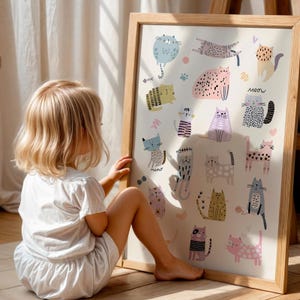 Adorable and funny digital cat print featuring a variety of playful cat breeds surrounded by cute little bows and love hearts. The soft pastel colors and charming cat illustrations show cats in fun activities like playing, lounging, and jumping. Perfect for a girls' room, playroom, or kids' room decor, this cute cat print adds a whimsical, lighthearted touch to any space. A great choice for cat owners, animal lovers, or as a playful gift for a child's bedroom or nursery.