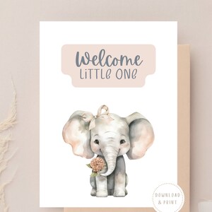 May include: A printable welcome sign with a watercolor illustration of a baby elephant holding a pink flower. The sign has the text "Welcome Little One" in a light pink rectangle.