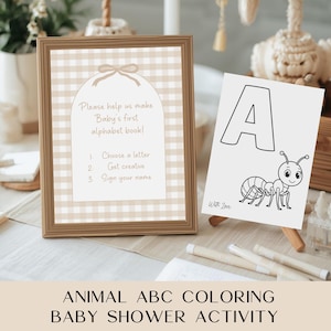 May include: A framed sign with the text "Please help us make Baby's first alphabet book!" and instructions. Beside it, a card with a large letter "A" and an ant illustration. The words "Animal ABC Coloring Baby Shower Activity" are at the bottom.