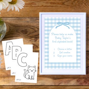 Baby’s First Alphabet Book printable baby shower activity with cute animal ABC pages, blank coloring cards, and customizable Canva sign. Fun guest activity, baby sprinkle idea, baby shower game, and creative keepsake. Includes PDF files for easy printing and matching decor.