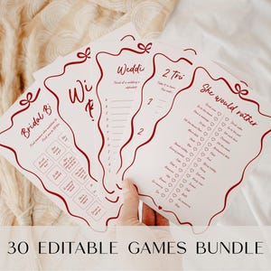 May include: A collection of white game cards with red decorative borders and text. The cards feature games such as "Bridal Bingo" and "She Would Rather." The text "30 EDITABLE GAMES BUNDLE" is at the bottom of the image.
