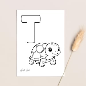 May include: A black and white illustration of a turtle and the letter "T" on a white background. The turtle has a smiling face and a patterned shell. The words "With Love:" are written at the bottom.