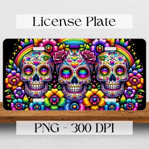 May include: Three colorful sugar skulls with rainbow eyes and hearts on their foreheads are surrounded by bright flowers and a rainbow on a black background.  License Plate.