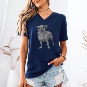 A navy blue unisex vee-neck t-shirt featuring a grayscale image of a Chihuahua standing with a cigarette in its mouth, giving a humorous, meme-style look perfect for dog lovers and fans of funny novelty shirts.